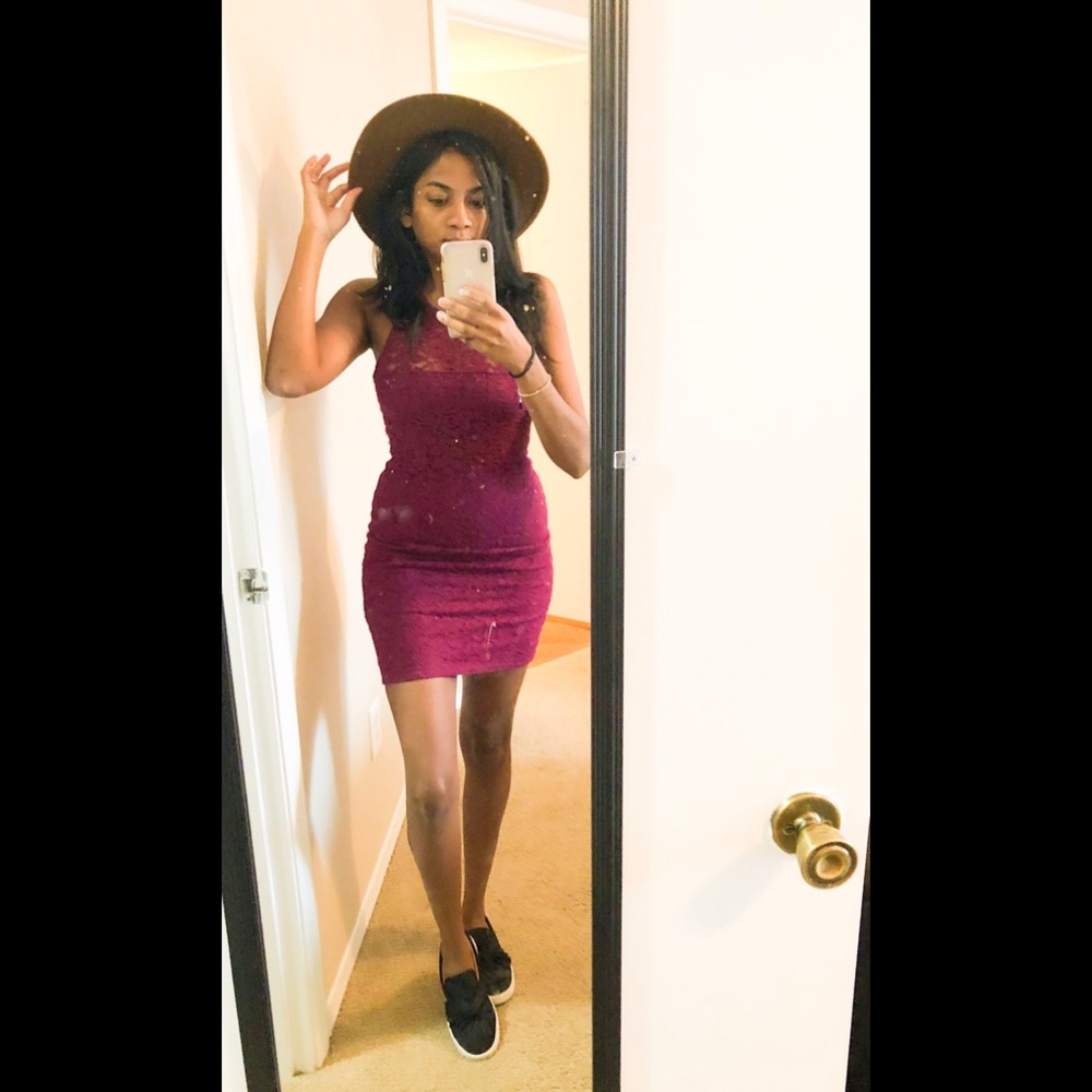 Burgundy high neck dress.